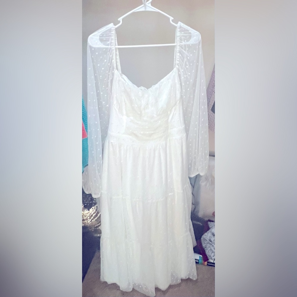 Lulu’s Affectionate Aura White Swiss Dot Tiered Bustier Midi Dress.